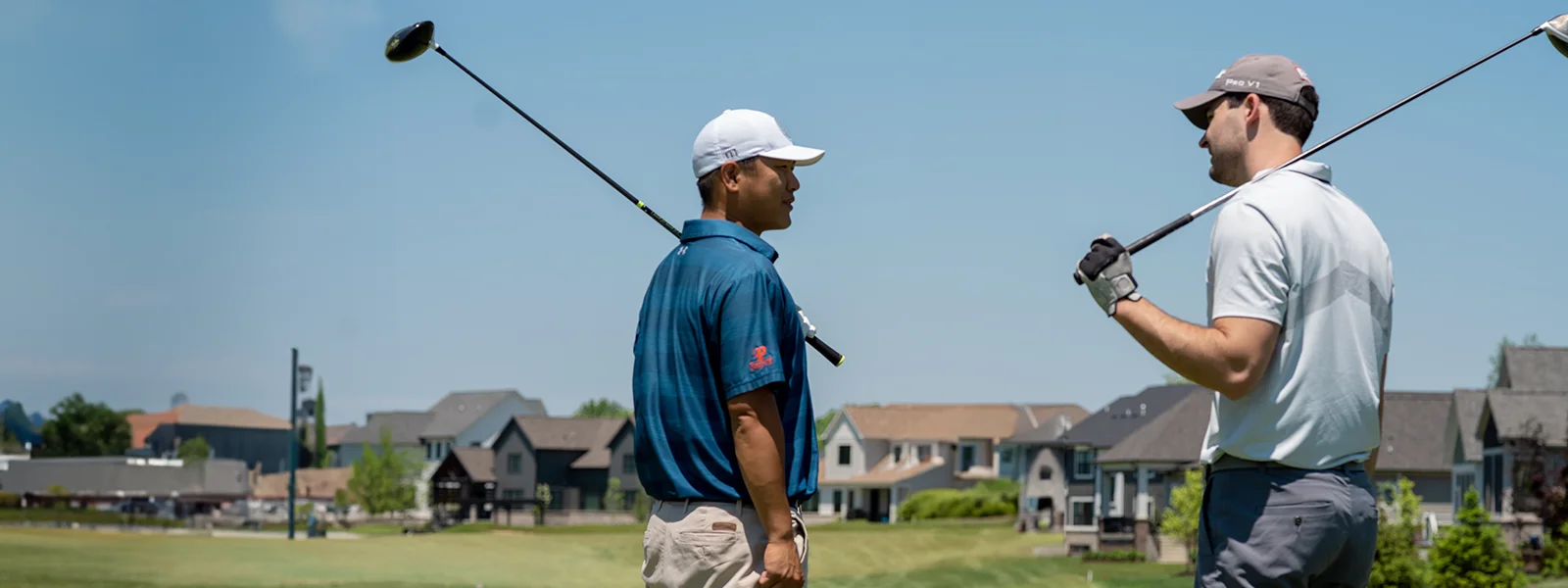 Two Men Golfing