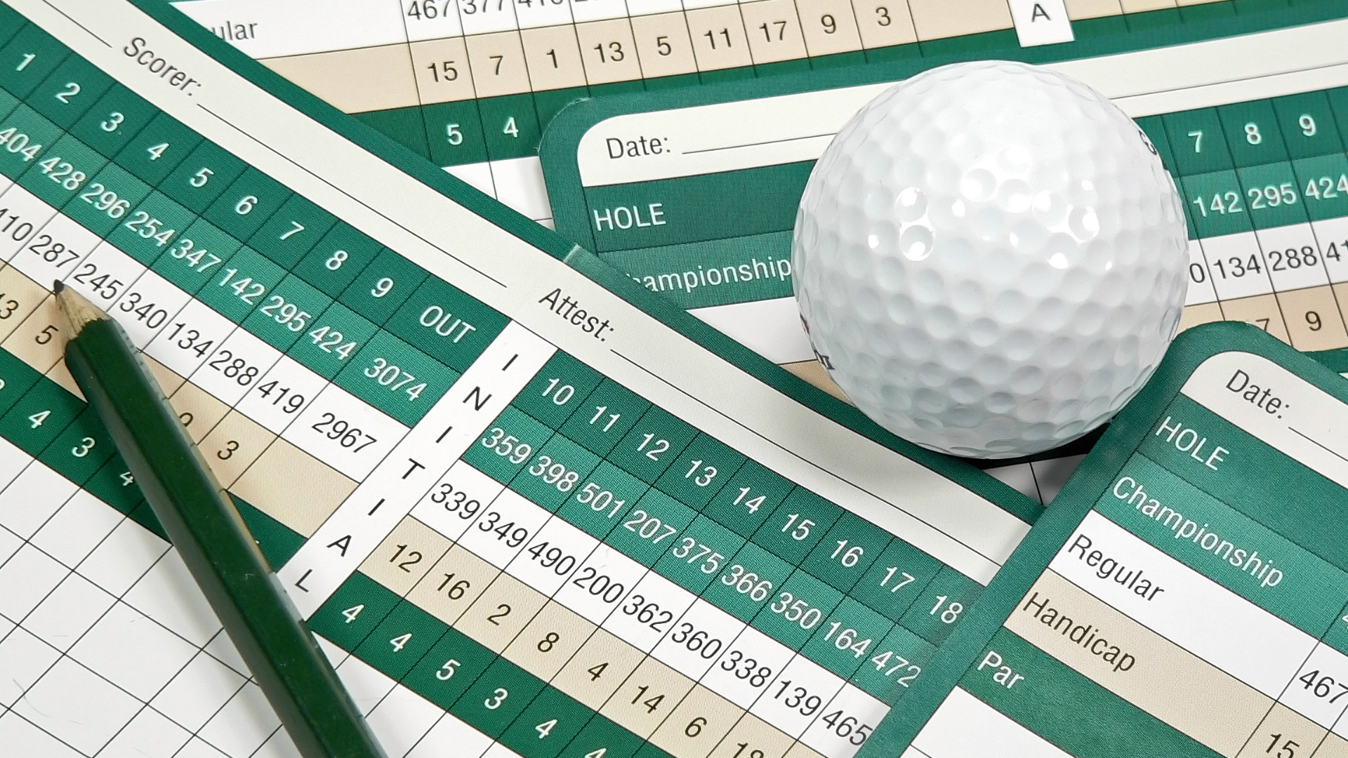 Golf score cards strewn about