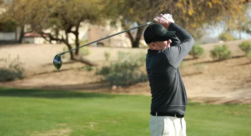 Hank Haney swinging his golf club