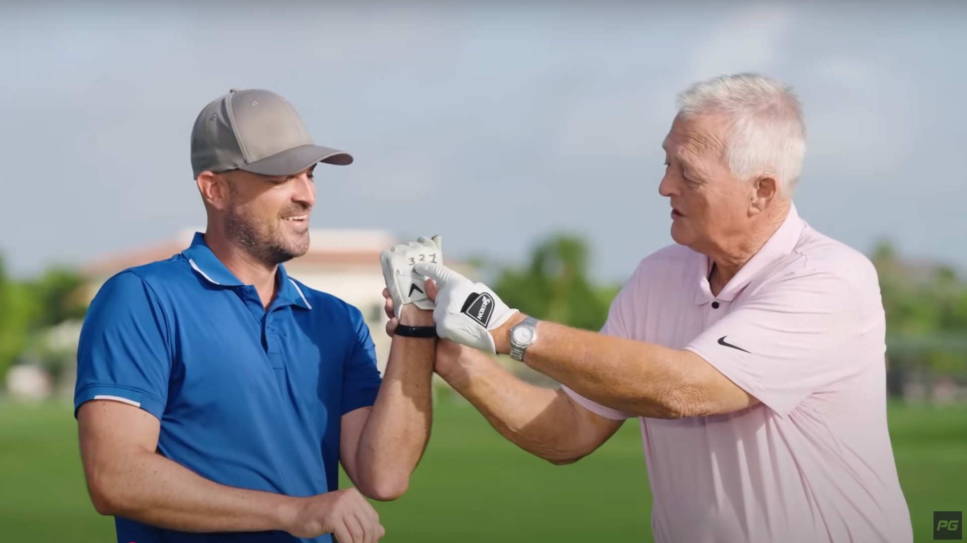 Legendary golf coach Martin Hall demonstrates the 3-2-1-None drill with Performance Golf coach Eric Cogorno.