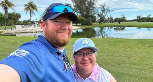 Performance Golf VIP School Student Shawn Lecrone with his wife on the golf course.