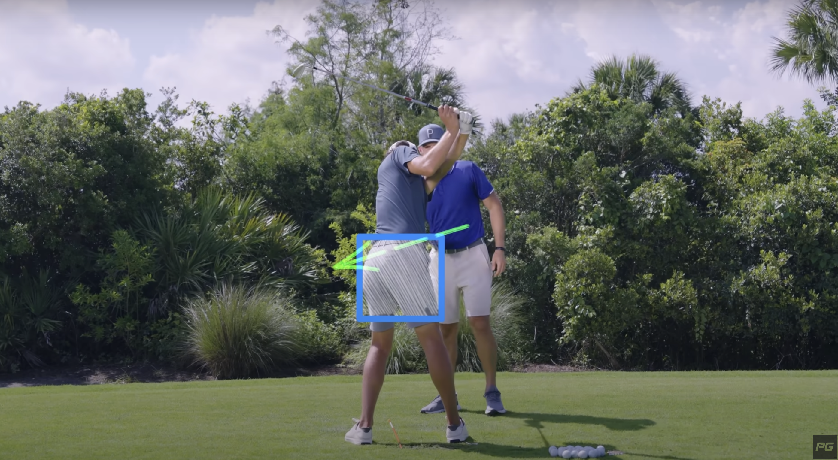 Performance Golf coaches Eric Cogorno and Grant Horvat use a golf alignment stick to showcase how to rotate the hips in the golf swing.