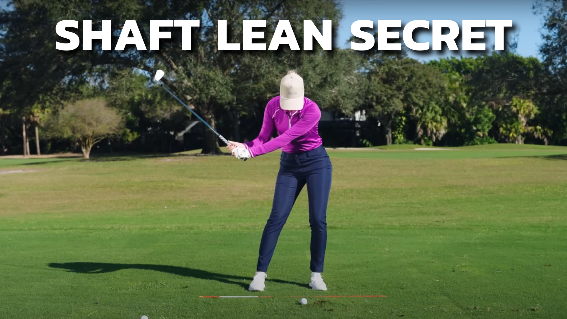 Performance Golf coach showcasing how to properly set up the golf swing shaft lean in the backswing.