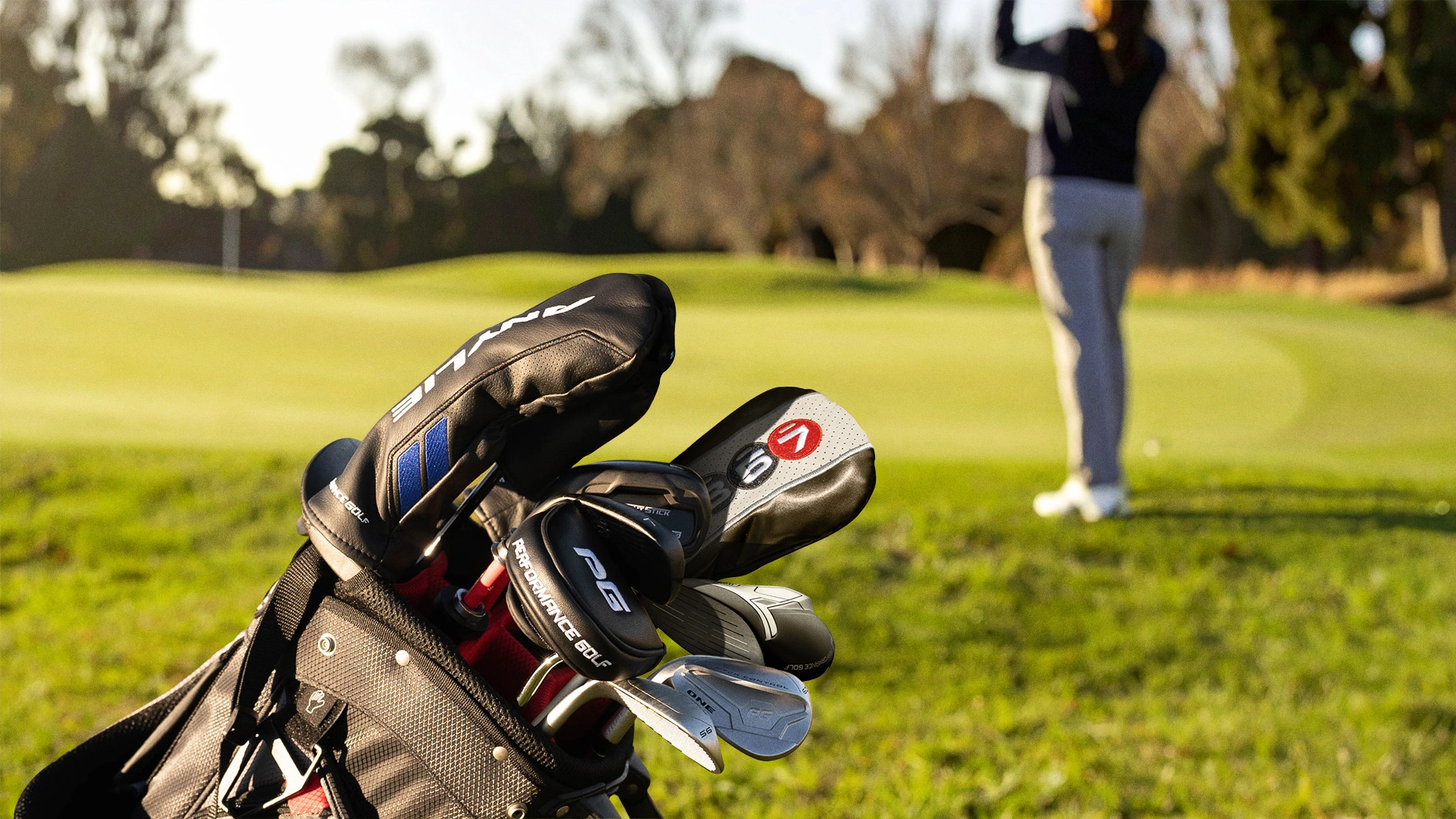 A streamlined golf bag featuring a variety of Performance Golf’s swing-fixing hybrid golf clubs, including the 357 Fairway-Hybrid Wood and AnyLie Hybrid.