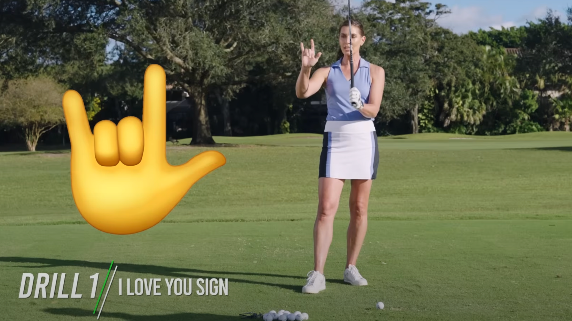 Erika Larkin showcases the “i love you” sign language sign as the proper way to form your fingers to grip the golf club.