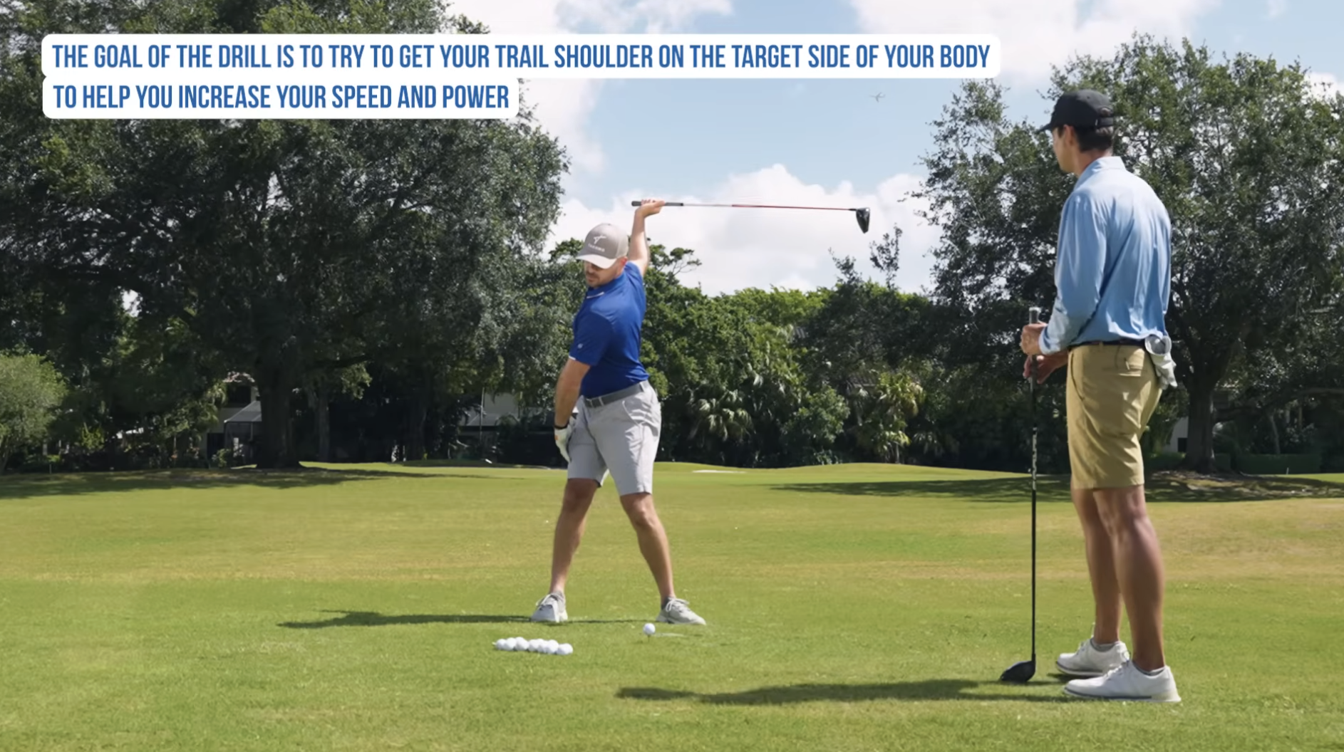 Performance Golf coach Eric Cogorno showing a drill on how to get your trail shoulder on the target side of your body in the backswing of the golf swing.