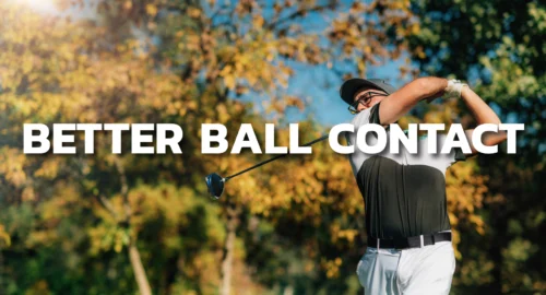 A golfer in fall foliage in the golf swing after hitting the ball.